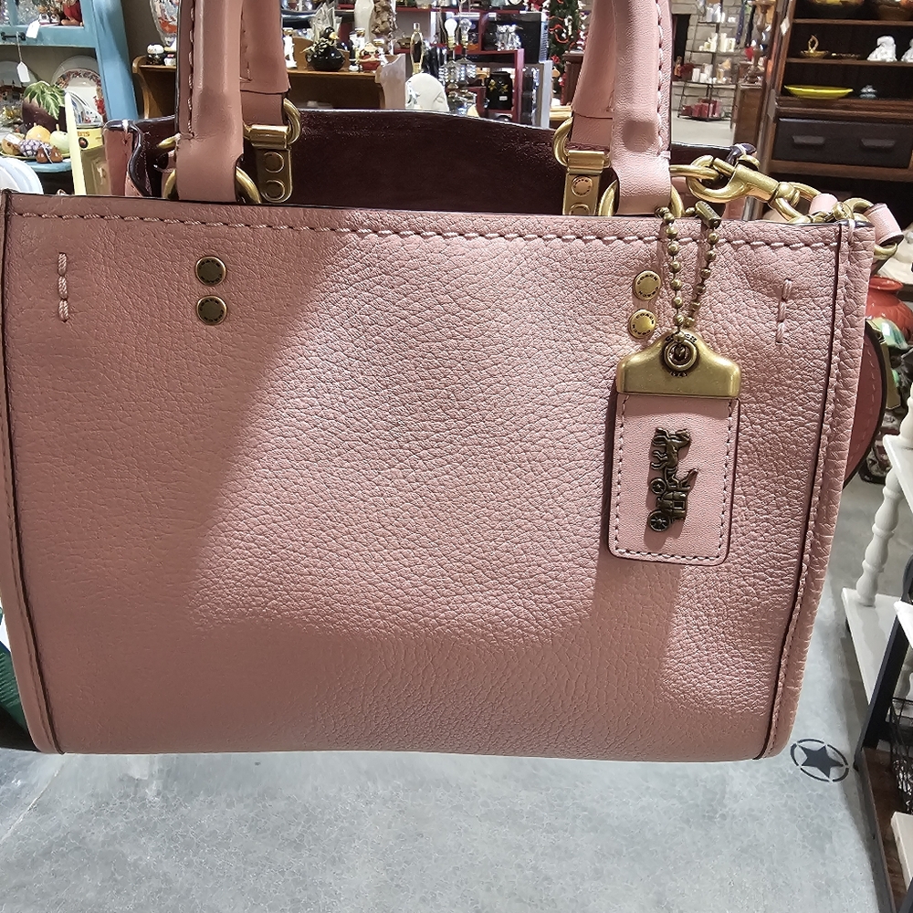 Coach 1941 Rogue Peony/brass  used/like new